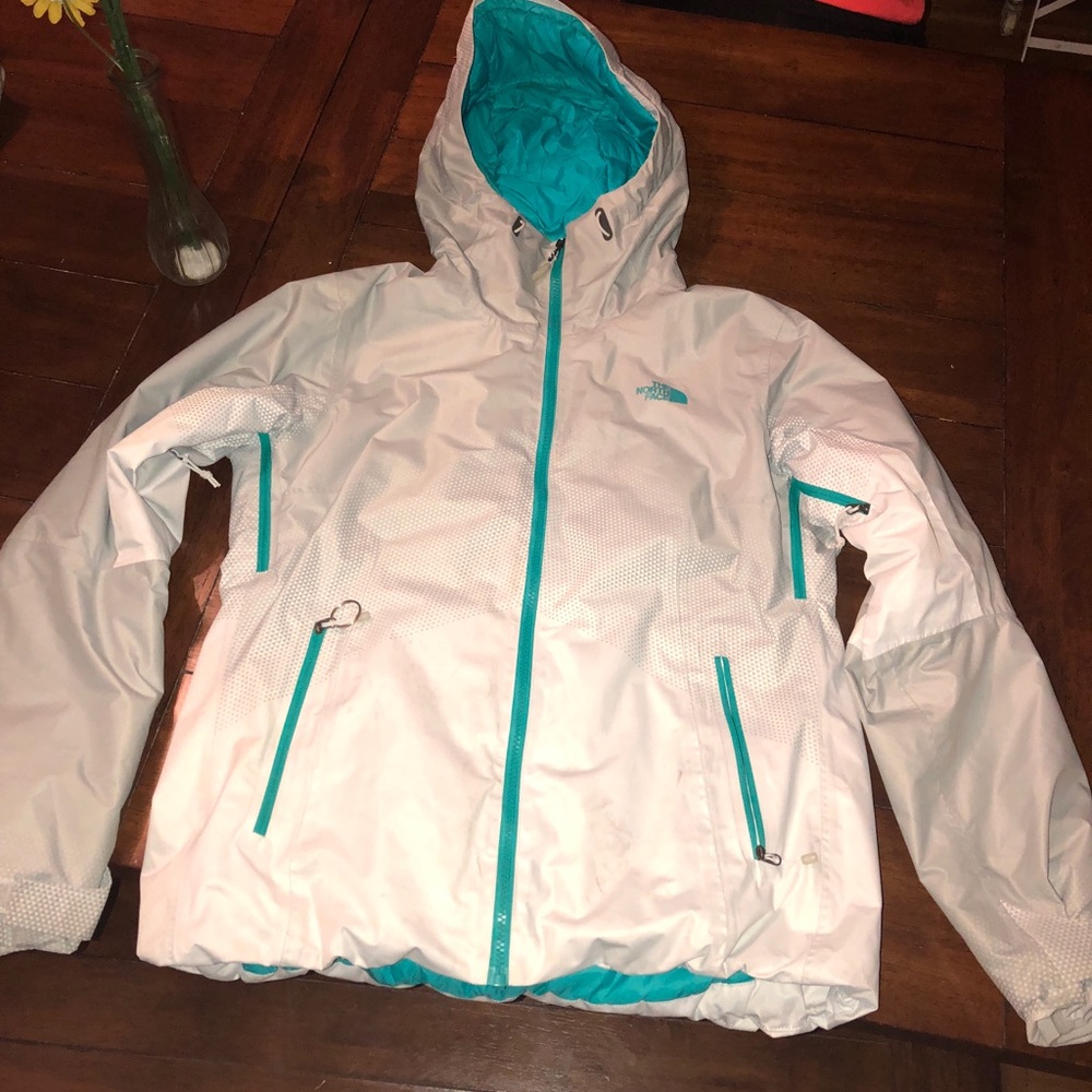 Grey north face jacket with teal interior